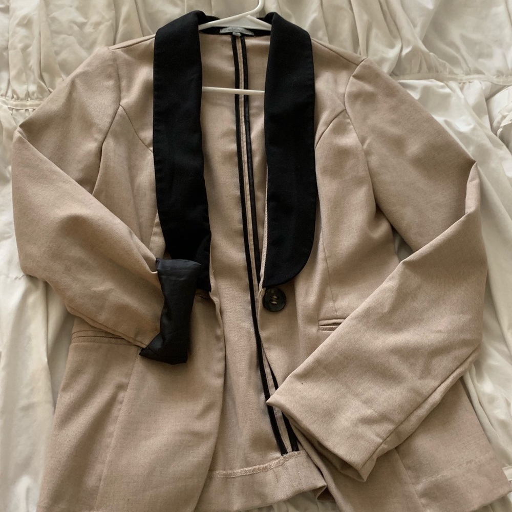 Nude blazer with black stripes